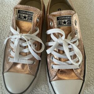 Gold low top converse